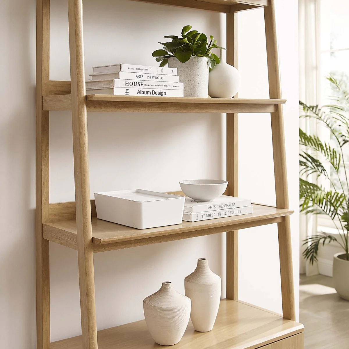 33 Inch Tiered Display Bookshelf with Concealed Storage - Image 3